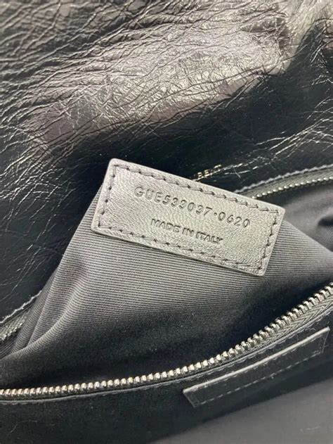 authentic ysl bag serial number.